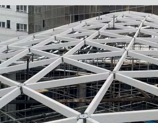 Close-up of space-frame spherical nodes and tubes